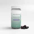 Naturecan Mushroom Gummies – clear bottle with teal label, Blackcurrant Flavour, 60 gummies, suitable for vegans, with round dark gummies beside it